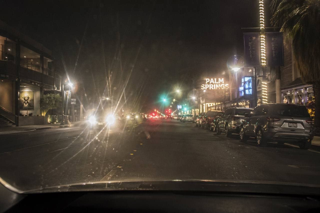Simulated view of night driving with early cataracts in Palm Springs - headlight glare and halos