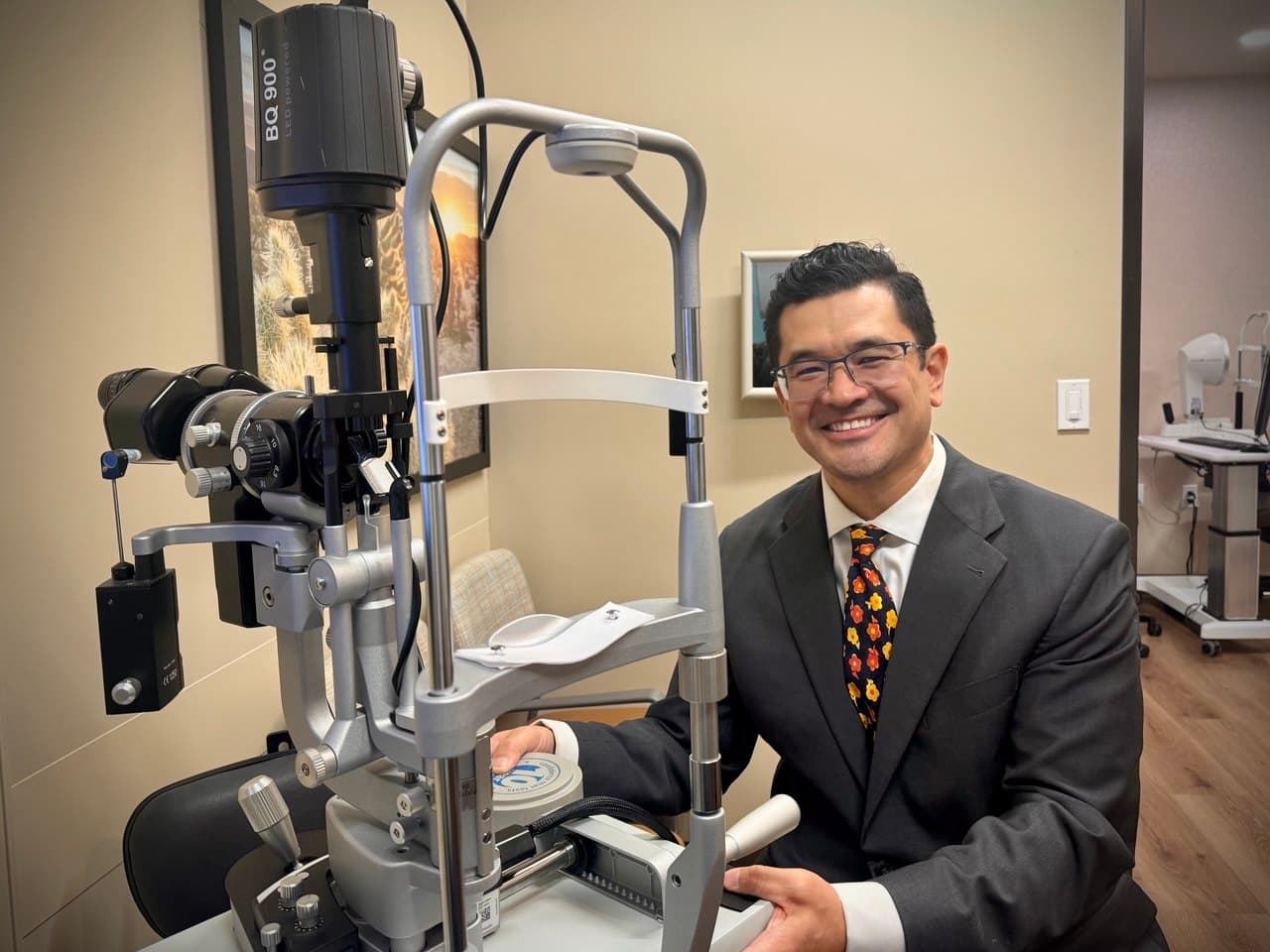 Dr. Tokuhara examining a patient at the slit lamp