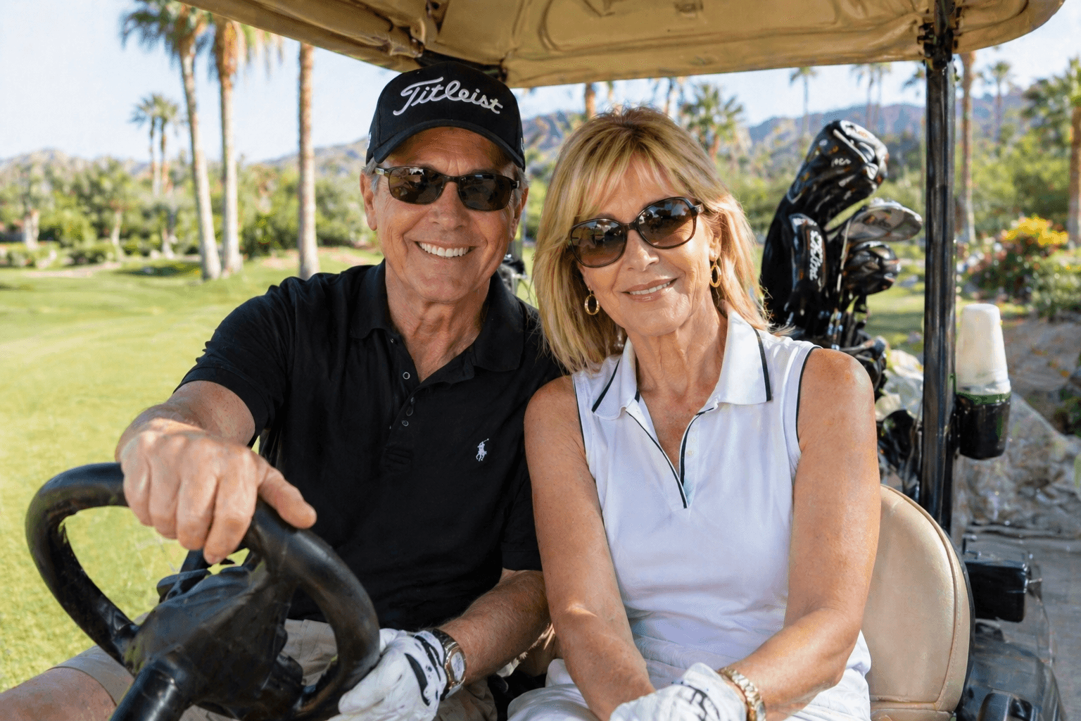 Couple riding in a golf cart - maintaining an active desert lifestyle