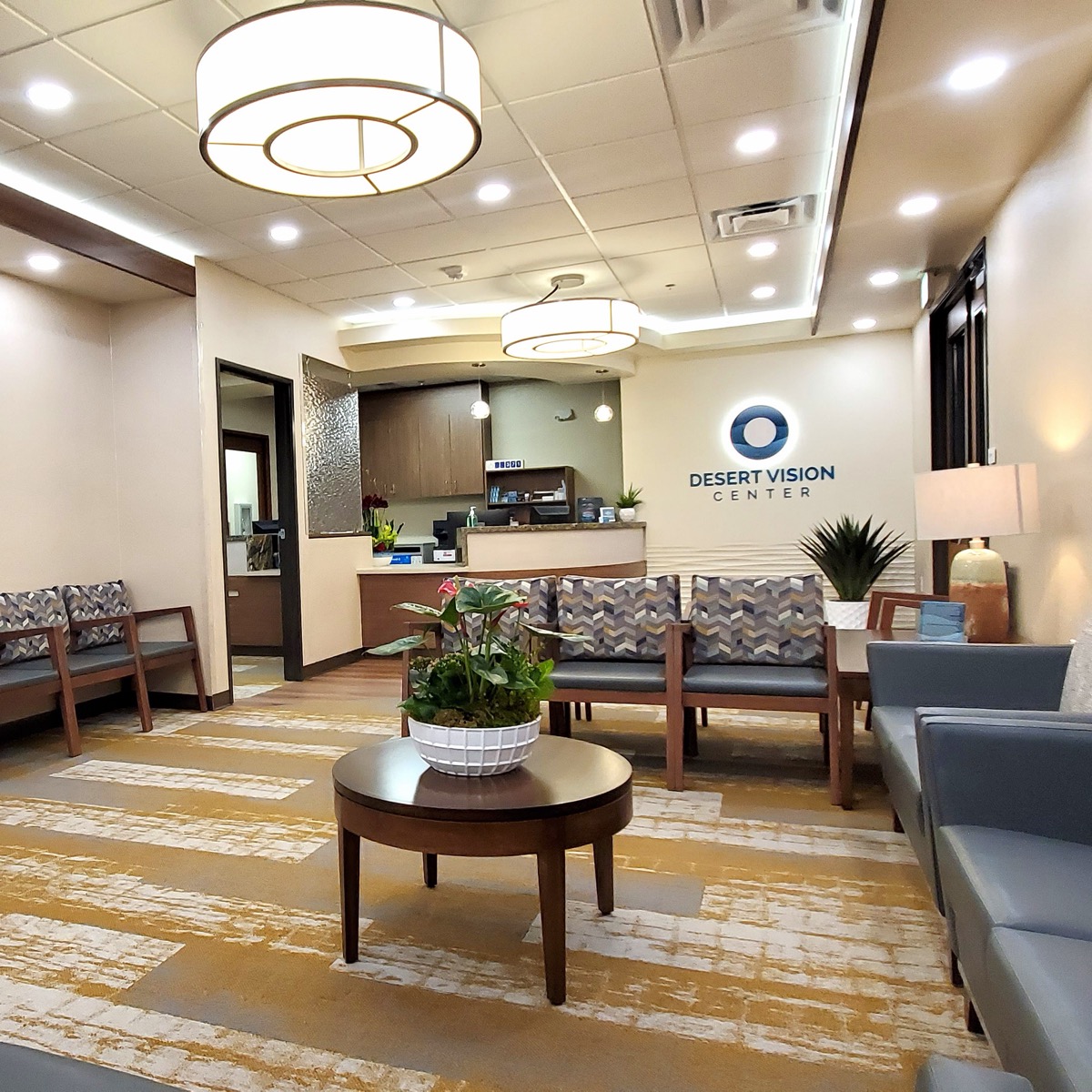 Desert Vision Center waiting area with logo signage and welcoming interior