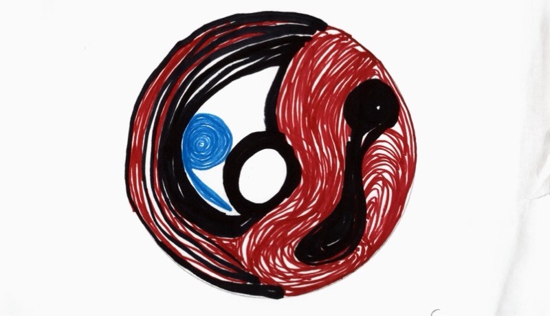 Patient drawing: red-black circular turbulence with blue spiral during cataract surgery