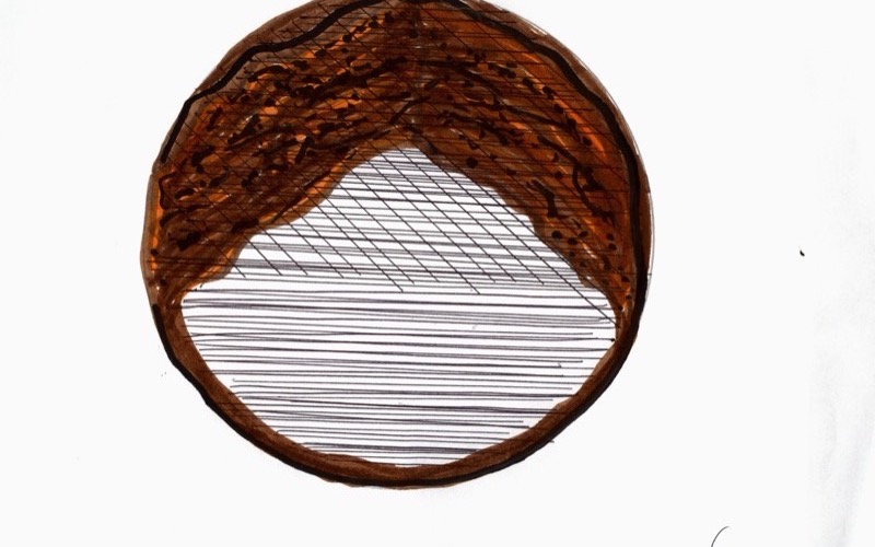 Patient drawing: dark amber textured horizon circle during cataract surgery